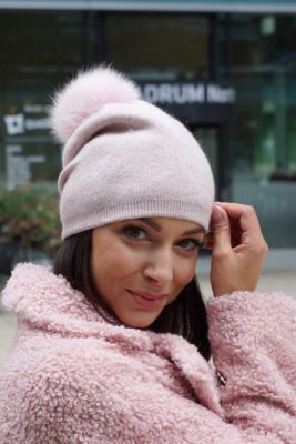 Knitted pink cashmere and wool hat with pompom pink