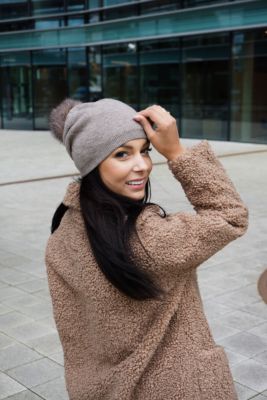 Knitted brown cashmere and wool hat with pompom brown