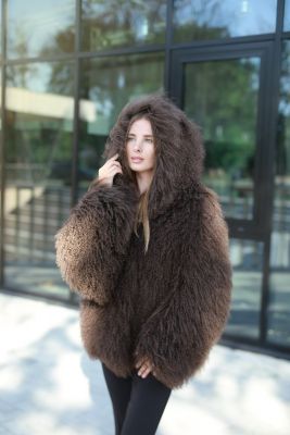 Stylish Mongolian fur coat in chocolate