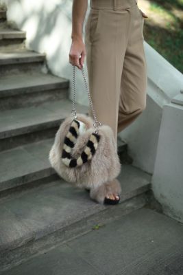 Fox fur handbag in beige with attached mink fur handle and chain