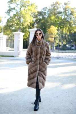 Mink fur coat in natural pastel color