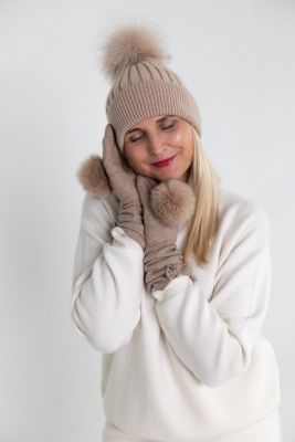 Set of cashmere and wool hat and mittens with pompoms in dusty rose