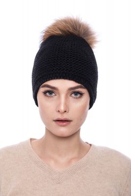 Knitted black wool hat with pompom raccoon