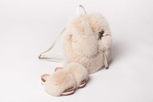 Set of fox fur backpack and fox fur slippers in beige