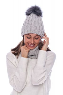 Knitted grey wool hat with pompom grey