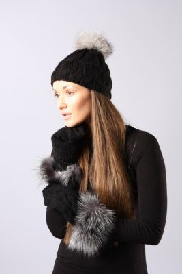 Knitted black wool hat with blue silverfox pompom