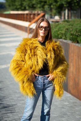 Fluffy jacket in mustard color