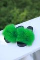 Slippers with fox fur decor in bright green