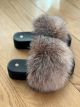 Slippers with fox fur in golden blue silver color
